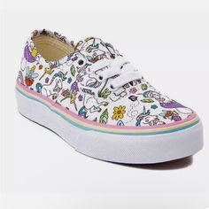 Step Into A World Of Magic With These Vans Fairy Tale Junior Unicorn Lace Up Low Fashion Sneakers. Vibrant Colors Of Pink And Purple On These Canvas Shoes Perfectly Capture The Essence Of Fairy Tale. These Athletic Sneakers Feature The Iconic Vans Off The Wall Logo And Are Part Of The Authentic Product Line. G Cute White Sneakers With Cartoon Print, Playful White Vans Sneakers, Cute Multicolor Sneakers For School, Cute Vans Sneakers For School, Cute Vans Sneakers For Spring, Spring Vans Sneakers, Cute Multicolor Vans Sneakers, White Vans Sneakers For School, Vans Off The Wall Logo