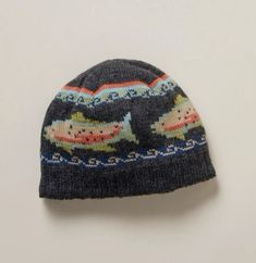 a knitted hat with fish on it