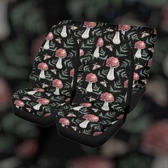 the seat covers are designed with mushrooms and leaves in black, pink and white colors