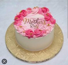 a mothers day cake with pink flowers on top