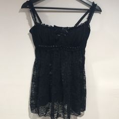 Fredericks Of Hollywood Black Babydoll Black Sequins Adjustable Straps And Back Has Underwire Nwot Black Sleeveless Coquette Camisole, Black Coquette Sleeveless Camisole, Black Lace Camisole In Flirty Style, Black Lace Camisole In Feminine Style, Black Lace Coquette Camisole, Black Coquette Camisole Top, Black Tops With Built-in Bra Coquette Style, Black Coquette Top With Built-in Bra, Black Babydoll