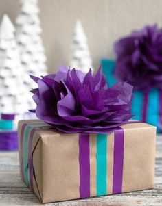 a present wrapped in brown paper with purple flowers