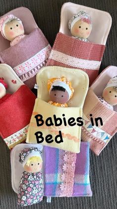 babys in bed made out of towels and blankets on the floor with text overlay that reads babies in bed