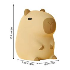 a close up of a stuffed animal on a white background with measurements for the body