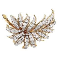 This vintage style pin is made of 18k yellow gold and weighs 15.00 DWT (approx. 23.33 grams). It contains 93 round G color and VS clarity diamonds weighing 6.50 CTTW. this piece measures 2 inches by 1.25 inches. Diamond Brooch, Vintage Stil, Floral Rings, Style Vintage, Brooch Pin, Vintage Style, Jewelry Collection, 50 %, Crown Jewelry