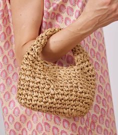 Micro slouch bag in toast. Trendy Natural Color Hobo Bag In Pouch Shape, On-the-go Natural Hobo Shoulder Bag, Summer Brown Shoulder Bag With Handle Drop, Trendy Natural Color Hobo Bag Pouch, Trendy Beige Shoulder Bag With Rolled Handles, Beige Hobo Bag With Double Rolled Handles, Beige Hobo Bag With Rolled Handles, Beige Hobo Shoulder Bag With Rolled Handles, Beige Hobo Bag With Rolled Handles For Shopping