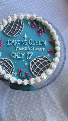 a cake that has been decorated with the words dancing queen and sweet only 17 on it