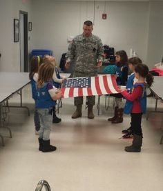 Respect Authority: Our Daisies earned their Respect Authority petal by learning how to fold a flag and touring the Army National Guard. Flag Folding, Junior Girl Scout Badges, Girl Scout Meeting Ideas, Daisy Ideas, Girl Scout Troop Leader, Brownie Scouts, Brownie Girl Scout, American Heritage Girls