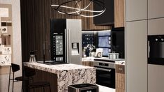 a modern kitchen with marble counter tops and stainless steel appliances, including an appliance