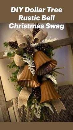 a christmas wreath with bells and pine cones hanging from the side of a wooden chair