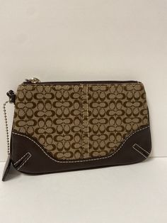 Brand: COACH Style: WRISTLET DESIGNER Color: MONOGRAM Size: SMALL SKU: 150-150154-32036 Palm Harbor Florida, Coach Zip Wristlet, Coach Multicolor Wristlet For Travel, Coach Black Wristlet With Zipper Pouch, Coach Multicolor Travel Wristlet, Designer School Bags, Coach Multicolor Wristlet, Color Grouping, Accessories Rings