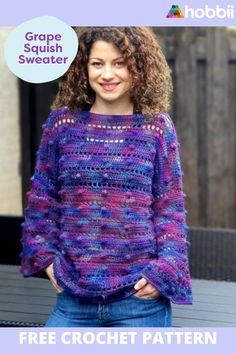 a woman wearing a crochet sweater with the words grape squish sweater on it