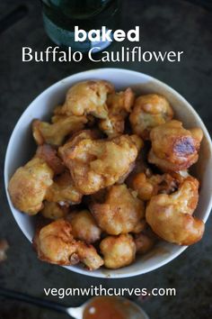 baked buffalo cauliflower in a white bowl