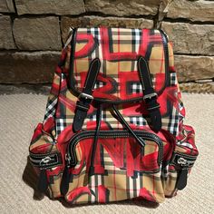 Burberry Nwt Limited Edition Red Graffiti Rucksack Backpack Designer Red Backpack, Luxury Red Backpack, Luxury Red Backpack For Travel, Red Graffiti, Rucksack Backpack, Burberry Bag, Limited Editions, Limited Time, Burberry