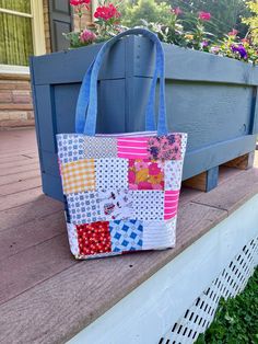 This retro recycled tote bag is the perfect sustainable gift for yourself or someone looking to be more eco-friendly and reduce their carbon footprint! This bag is wholly upcycled- the outer layer is from vintage quilt tops made out of scraps and old clothing by my great grandmother; the lining is made from fabric remnants from my grandmother; the straps are made from leftover denim that my aunt had. The eclectic mix of colors, fabric types, and patterns gives these shoulder bags a bohemian, hip Recycled Bags, Boho Shoulder Bag, Bohemian Purse, Patchwork Tote Bags, Recycled Tote, Womens Messenger Bag, Recycle Bag, Hippie Look, Design Photoshop