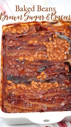 brown sugar and bacon baked beans in a white casserole dish