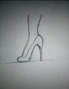 a drawing of a high heeled shoe on a white paper background with the bottom part drawn in pencil