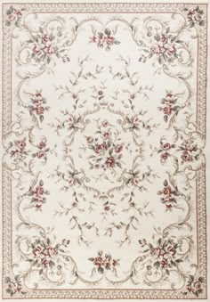 a white rug with red and green flowers on the bottom, in an ornate pattern