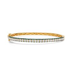 3 sided bold and bejeweled these bangles feature emeralds. Gemstone: 2.8 Carats of Emeralds, 1.81 Carats of G-H Color White Diamonds Metal: 18K Gold, 12g Colors: Yellow Gold, White Gold, Rose Gold Finishing: Dark Rhodium Accents Diamond Bangle, Emerald Diamond, White Diamonds, Jennifer Lopez, Gold Rose, Diamond White, Gold Bracelet, Emerald, 18k Gold