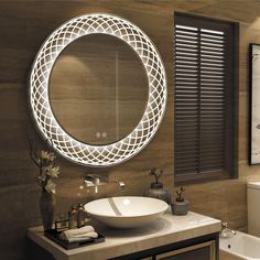 a bathroom with a sink, mirror and bathtub