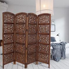 the room divider is made from wood