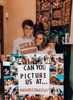 a man and woman standing next to each other holding a sign that says can you picture us at