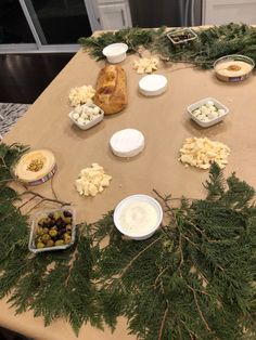 a table topped with lots of different types of food