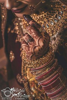 a woman with henna on her hands