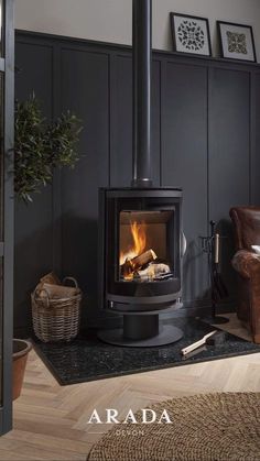 a wood burning stove sitting inside of a living room