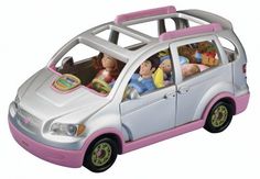 a toy car with many stuffed animals in it