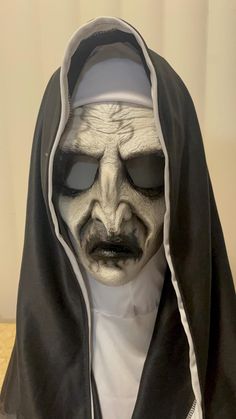 This latex mask is inspired by the infamous Valak will frighten anyone this Halloween! This is a handcrafted mask sculpted by me, and provides an eerie resemblance of a Nun showcased in modern horror.  How was this piece made? I sculpted the likeness of this horror icon in WED clay, and created a plaster mold. I cast latex in the mold and pulled out a skin which was then painstakingly painted to match that of movie quality.  This mask has an elastic band that will conform to most head shapes and sizes. The wide eye holes alow for incredible visibility! you can blend the mask to your face if you use black face paint around your eyes!  Each one is handmade so there may be slight differences!  *THESE MASKS ARE ONLY THE LATEX HALF MASK... headdress not included Horror Cosplay, Black Face Paint, Mask Horror, Art Examples, Eye Hole, Horror Masks, Half Mask, Horror Icons, Cosplay Halloween