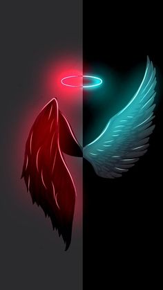 two different colored angel wings with one red and one green glowing in the dark side by side