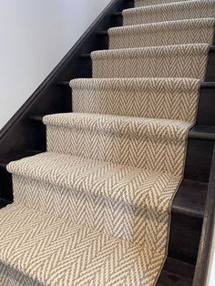 an image of some stairs with carpet on them