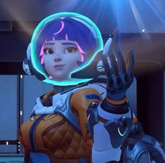 an overwatching female character in a futuristic suit holding her hand up to the camera