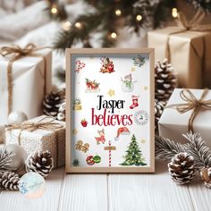 a christmas card with the words jasper belivees surrounded by presents and pine cones