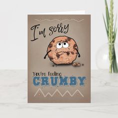 a greeting card with an image of a chocolate chip cookie and the words i'm sorry you're feeling grumpy