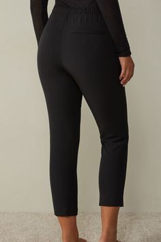 Full-length trousers featuring two pockets, faux back pocket and covered elasticated waist. Minimal Stretch Workwear Bottoms With Pockets, Comfort Stretch Full-length Bottoms For Workwear, Comfort Stretch Black Bottoms For Workwear, Straight Leg Bottoms With Elastic Waistband And Minimal Stretch, Elastane Pull-on Pants For Loungewear, Elastane Pull-on Loungewear Bottoms, Full Length Elastane Pants With Side Pockets, Elegant Bottoms With Pull-on Style And Comfort Stretch, Elegant Comfort Stretch Pull-on Bottoms