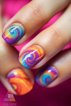 Dive into the world of cool summer nails with this psychedelic design! The bold mix of colors and patterns is perfect for making a statement this summer. Find more cool summer nail designs and inspiration at nailhow.com. Cool Summer Nails