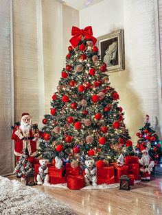 a christmas tree decorated with red and silver ornaments