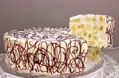 a white cake with chocolate swirls and the words be my maho written on it