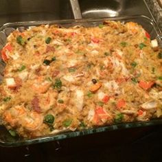 a casserole dish sitting on top of a stove