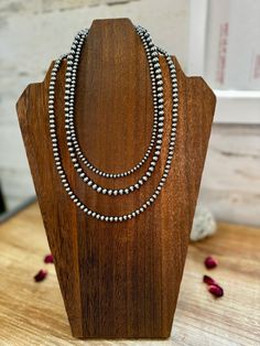 Build your own ! pick the size of the sterling silver pearls 4-5-6-8-10-12 mm and pick the length hand strand in Texas. come with sterling silver .925 lobster and chain For the best layering photo show : 14 inch 4 mm 16 inch 6 mm 18 inch 5 mm