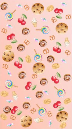 a pink background with lots of cookies and candies