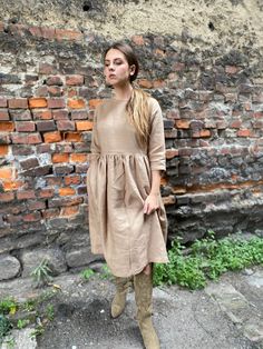 "Spring dress, Write the selected color in the message Handmade nut brown linen dress with 3/4 long sleeves and 2 pockets , perfect for casual wear and suitable for any occasion in any season Details: - 100% natural linen produced in Europe ; - medium weight (180 gram per square meter); - color: nut brown, could be any from our colors catalog (color samples at the photo); Made to order, approximately a few days, If you have any questions please message me and I will be glad to answer. Size guide Brown Linen Spring Dress, Brown Linen Long Sleeve Dress, Spring Long-sleeve Neutral Linen Dress, Spring Long Sleeve Neutral Linen Dress, Neutral Long Sleeve Linen Dress For Spring, Spring Neutral Long Sleeve Linen Dress, Beige Linen Dress With Relaxed Fit For Fall, Casual Brown Linen Dress For Fall, Casual Brown Linen Midi Dress