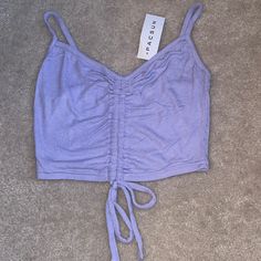 Lavender Cropped Tank With Tie Cinch Detail From Pacsun, Size Xs Nwt Drawstring Tank Top For Beach In Spring, Casual Ruched Tank Top For Vacation, Casual Drawstring Tank Top For Beach, Spring Beach Crop Top With Drawstring, Fitted Lavender Crop Top Casual, Lavender Fitted Casual Crop Top, Fitted Lavender Casual Crop Top, Fitted Lavender Crop Top For Casual Wear, Trendy Lavender Tops For Beach