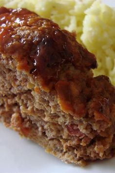 meatloaf, mashed potatoes and gravy on a plate