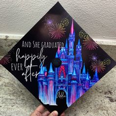 a graduation cap with the words and she graduated happily after