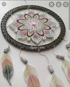 an image of a dream catcher made out of paper