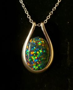 Large Black Lab Created Opal 13x18mm Multicolored Fire, See Video! The Base Is Black And There Is Nice Red, But Its Hard To Tell In Photos. Sleek And Elegant 925 Sterling Silver Bezel Split Loop Bail Pendant with Sterling Chain. Chain Length Options Available By Messaging Seller. Great Gift! Gift Box Included *Also Have In A Different Black Opal Type, White And Peacock Blue, See Listings Formal Multicolor Sterling Silver Necklace, Rainbow Topaz Ring, Black Opal Necklace, Rainbow Topaz, Rainbow Quartz, Fire Opal Ring, Black Lab, Peacock Blue, Quartz Necklace