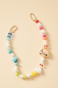 Charming new-trend alert: jewelry for your bag. | Multi-Beaded Bag Charm by Anthropologie in White, Women's, Resin Diy Purse Charms Ideas, Trendy Beaded Jewelry For Everyday Use, Trendy Everyday Beaded Jewelry, Purse Charms Ideas, Beaded Bag Charm, Diy Purse Charms, Trendy Beaded Bracelets, Anthropologie Bag, Charms For Bags